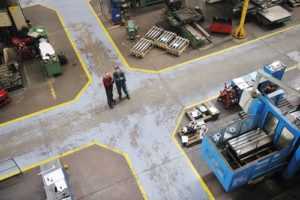 company floor ready for cleaning because employees on summer vacation