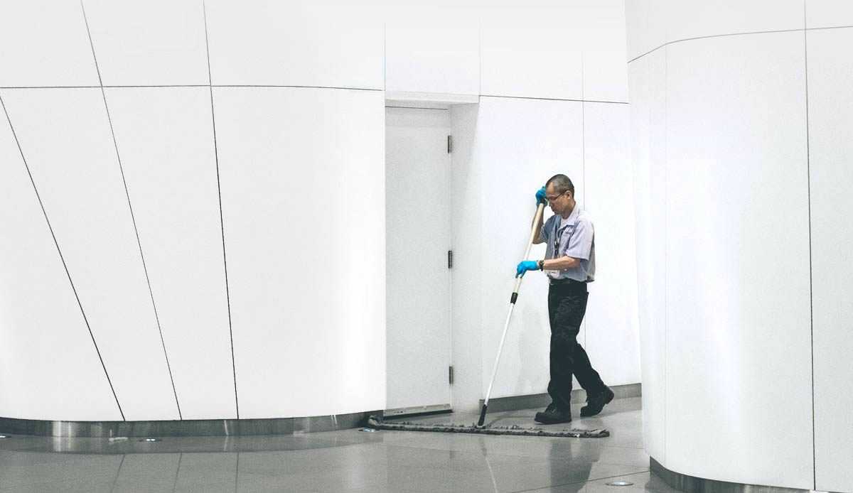 cleaner doing task off commercial cleaning services list