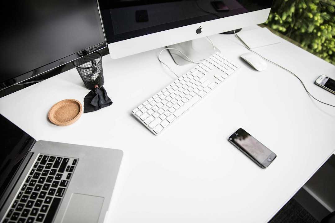 cluttered office desk beside a clean organized workspace