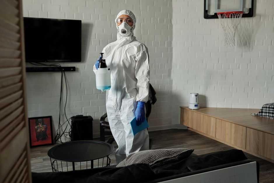 disinfection technician cleaning an office